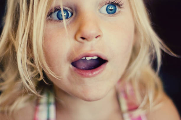 surprised girl with blue eyes.